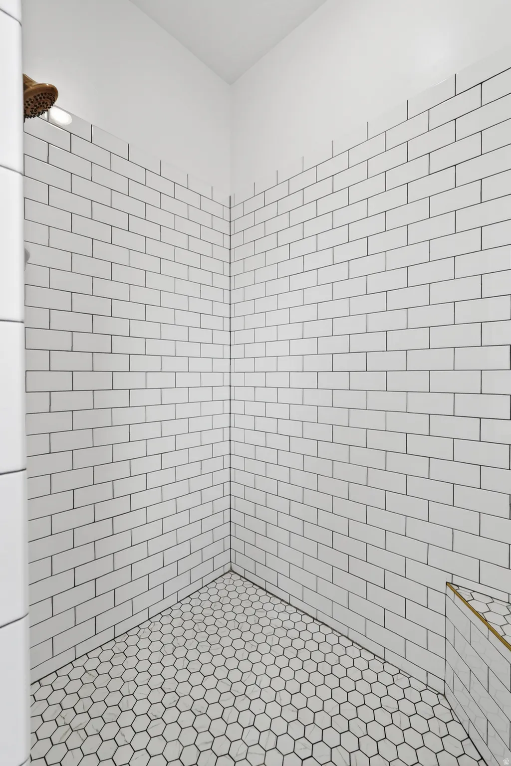 Full bathroom with a tile shower
