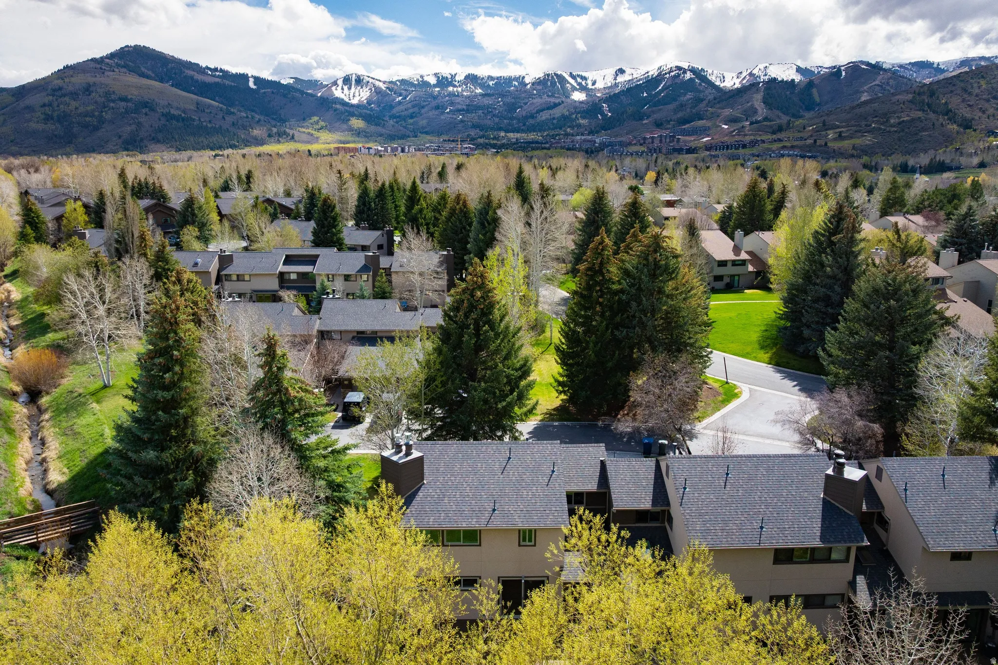 Aerial perspective of suburban area with mountains