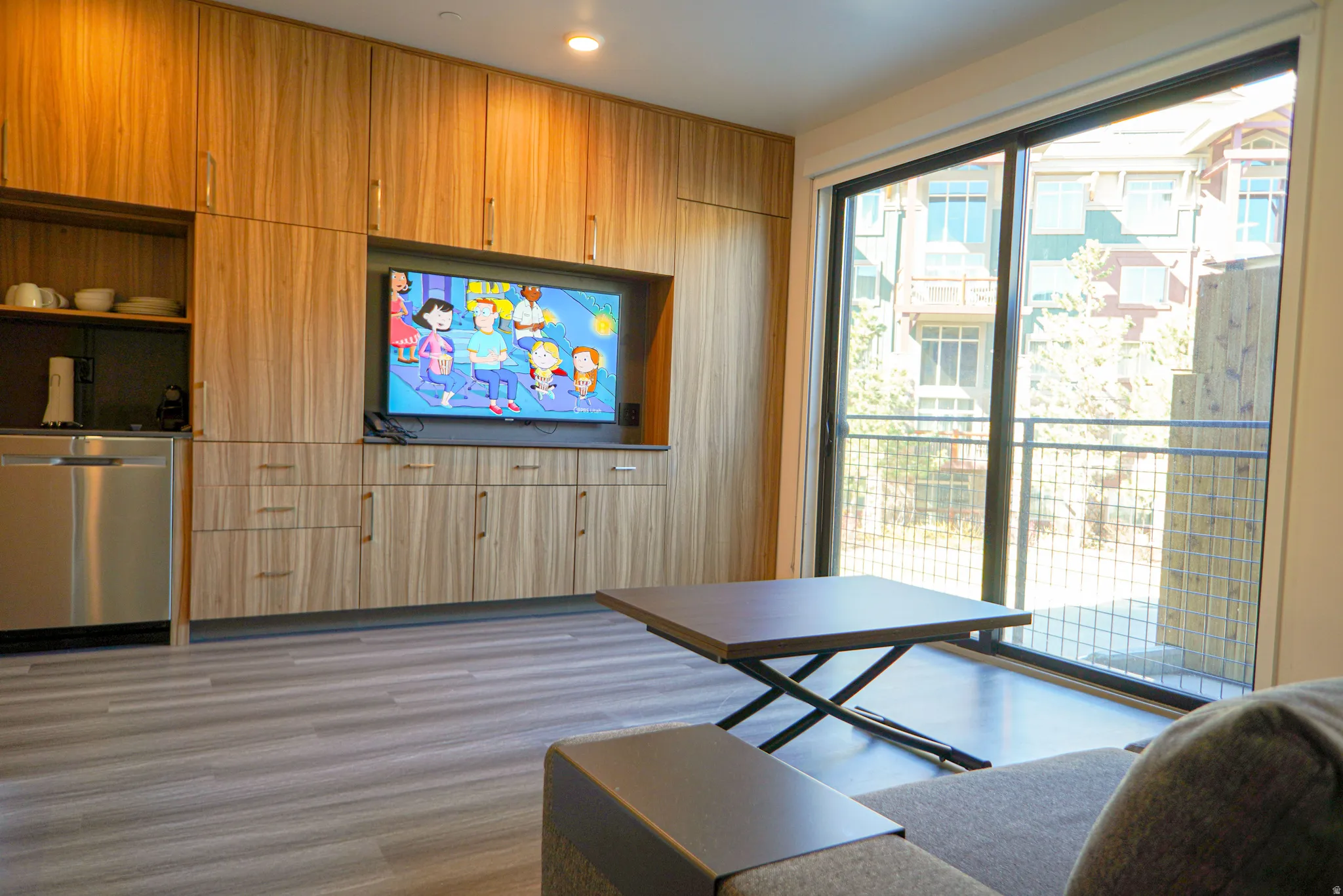 Living area featuring light wood-style floors