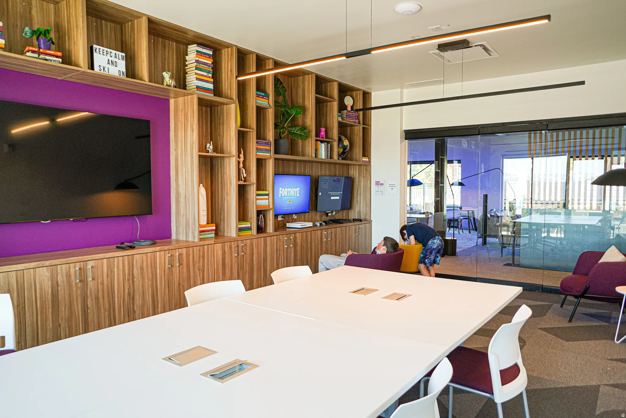 Dining room featuring built in shelves