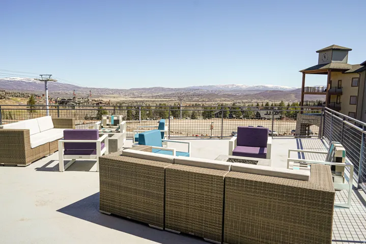 View of patio featuring an outdoor hangout area and a mountain view