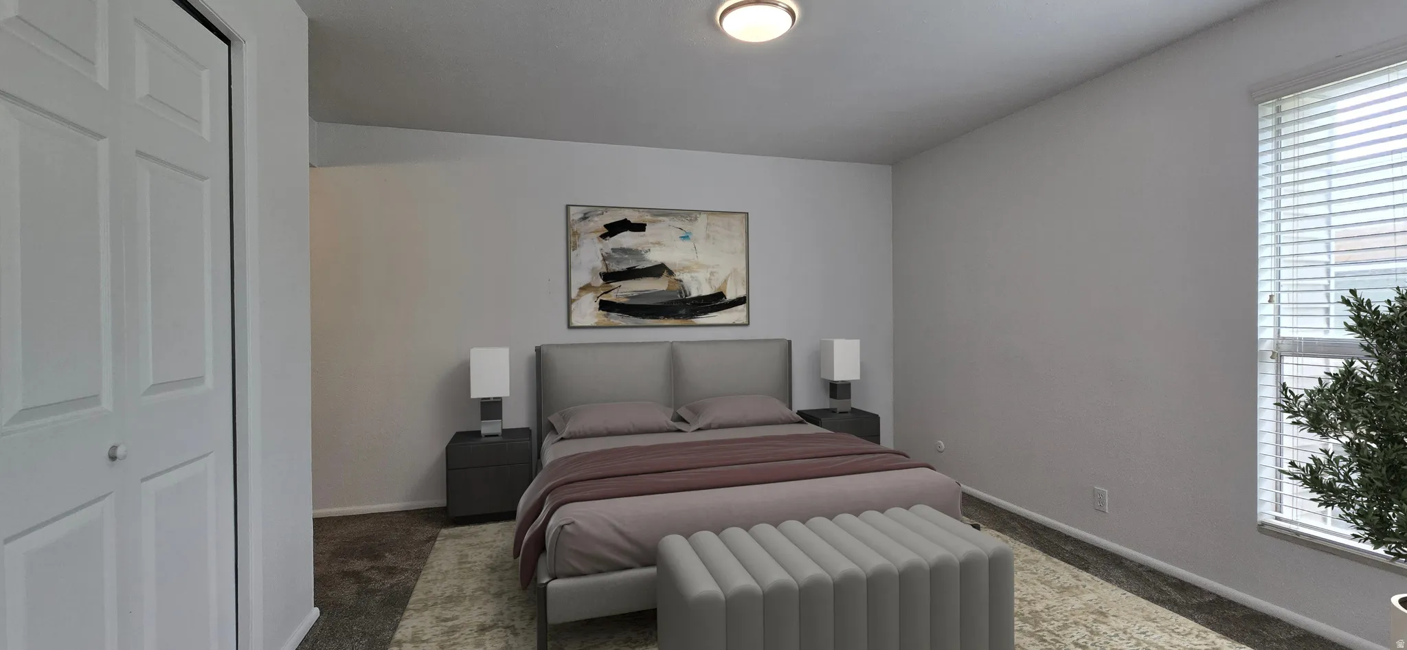 Carpeted bedroom featuring a closet