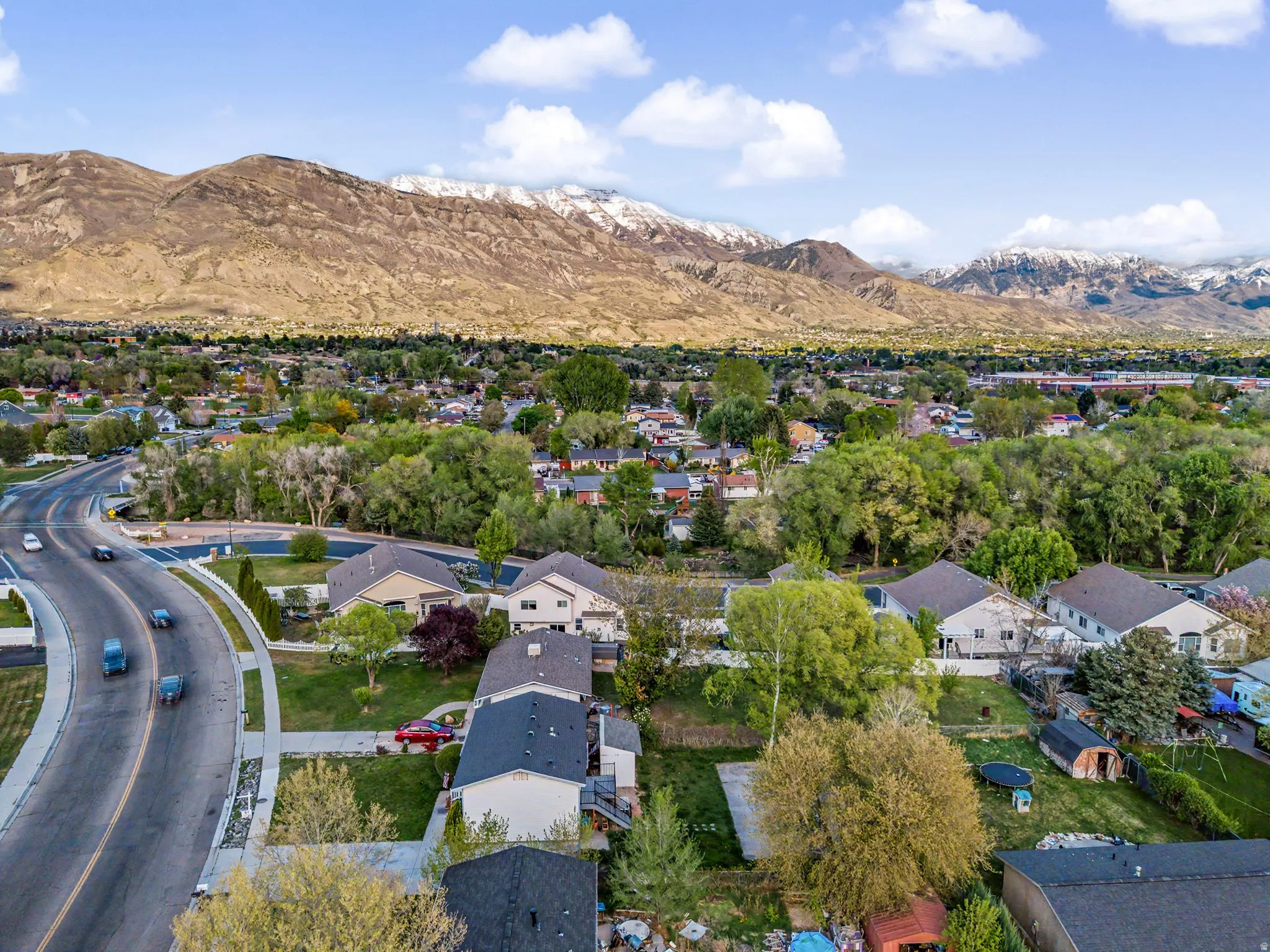 Aerial view of residential area with a mountain backdrop