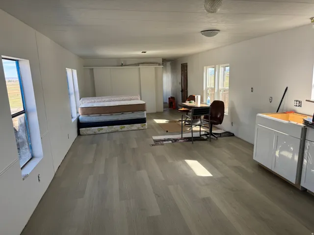 Bedroom with light wood finished floors