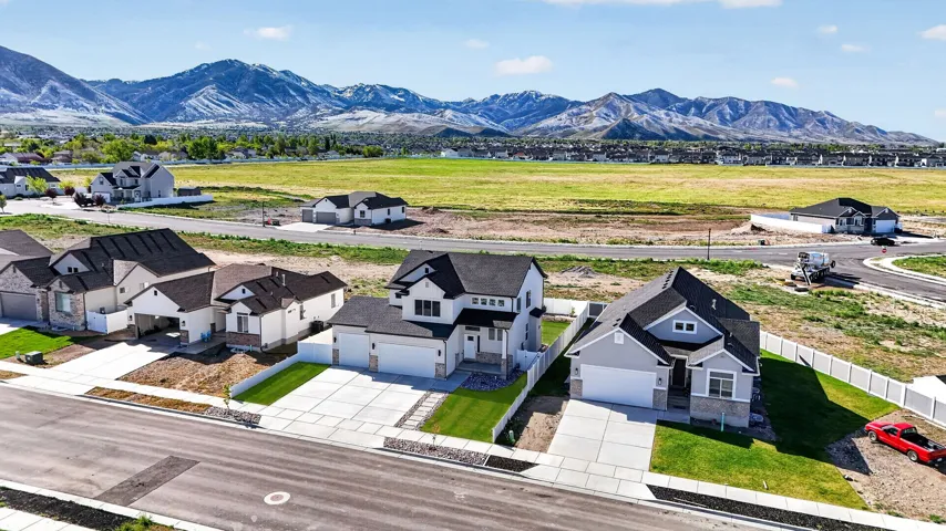 Aerial view of residential area with a mountainous background