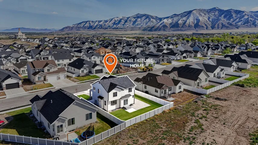 Aerial view of residential area with mountains