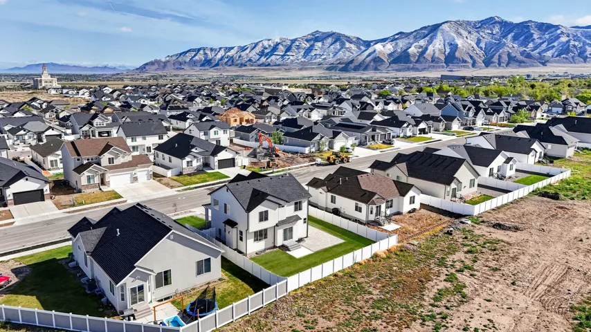 Aerial view of residential area with mountains