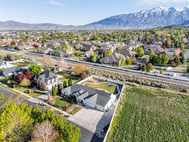 Aerial view of residential area with a mountain backdrop
