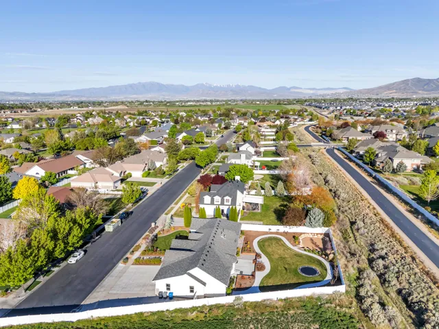 Aerial view of residential area with a mountain backdrop