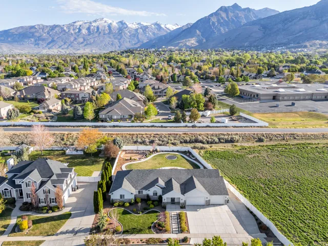 Aerial view of residential area featuring mountains