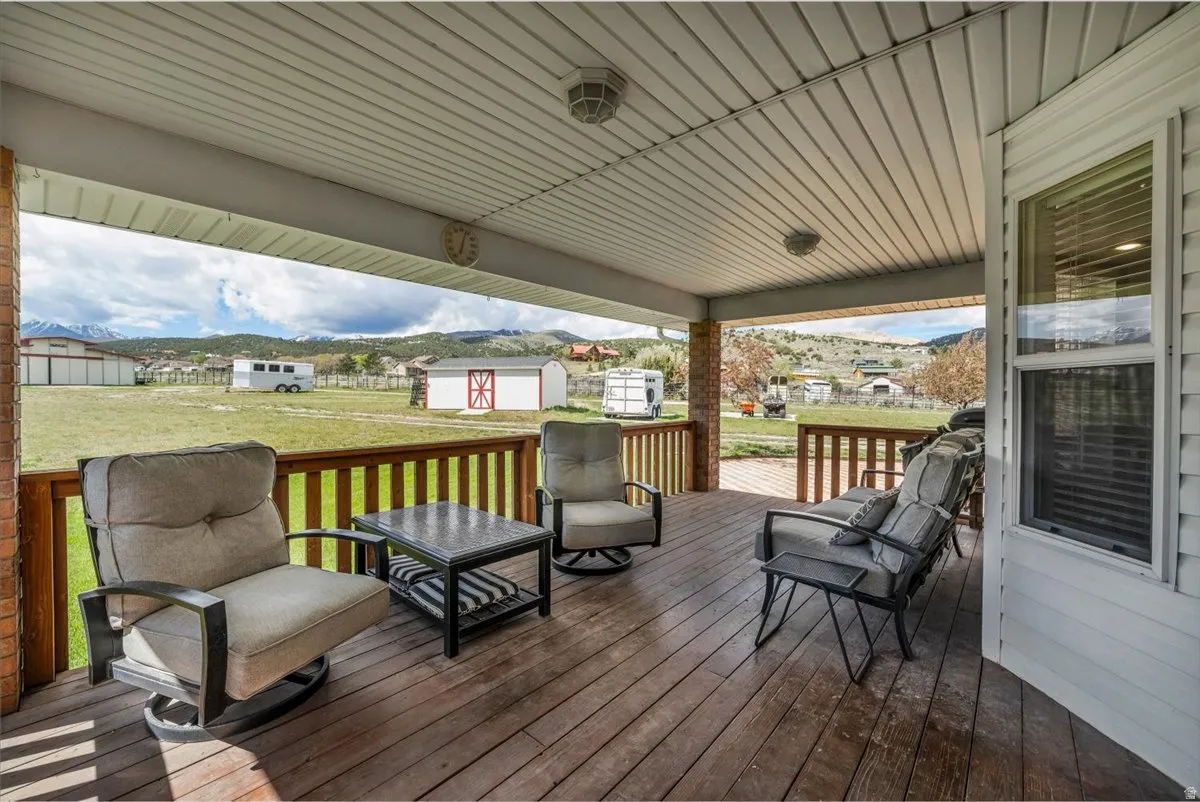 Gorgeous covered patio to look over the animals and property.