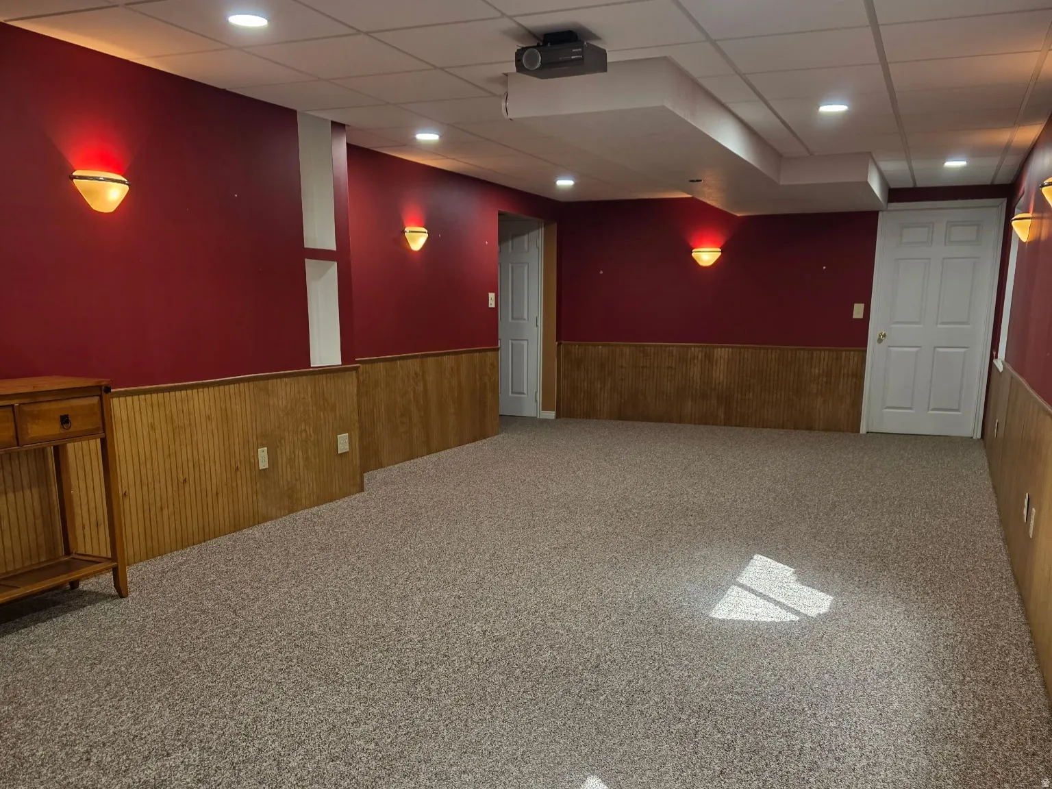 Spacious, fully-finished basement living space - perfect for entertaining (there's a drop down screen and projector for epic movie nights) or possible ADU conversion.