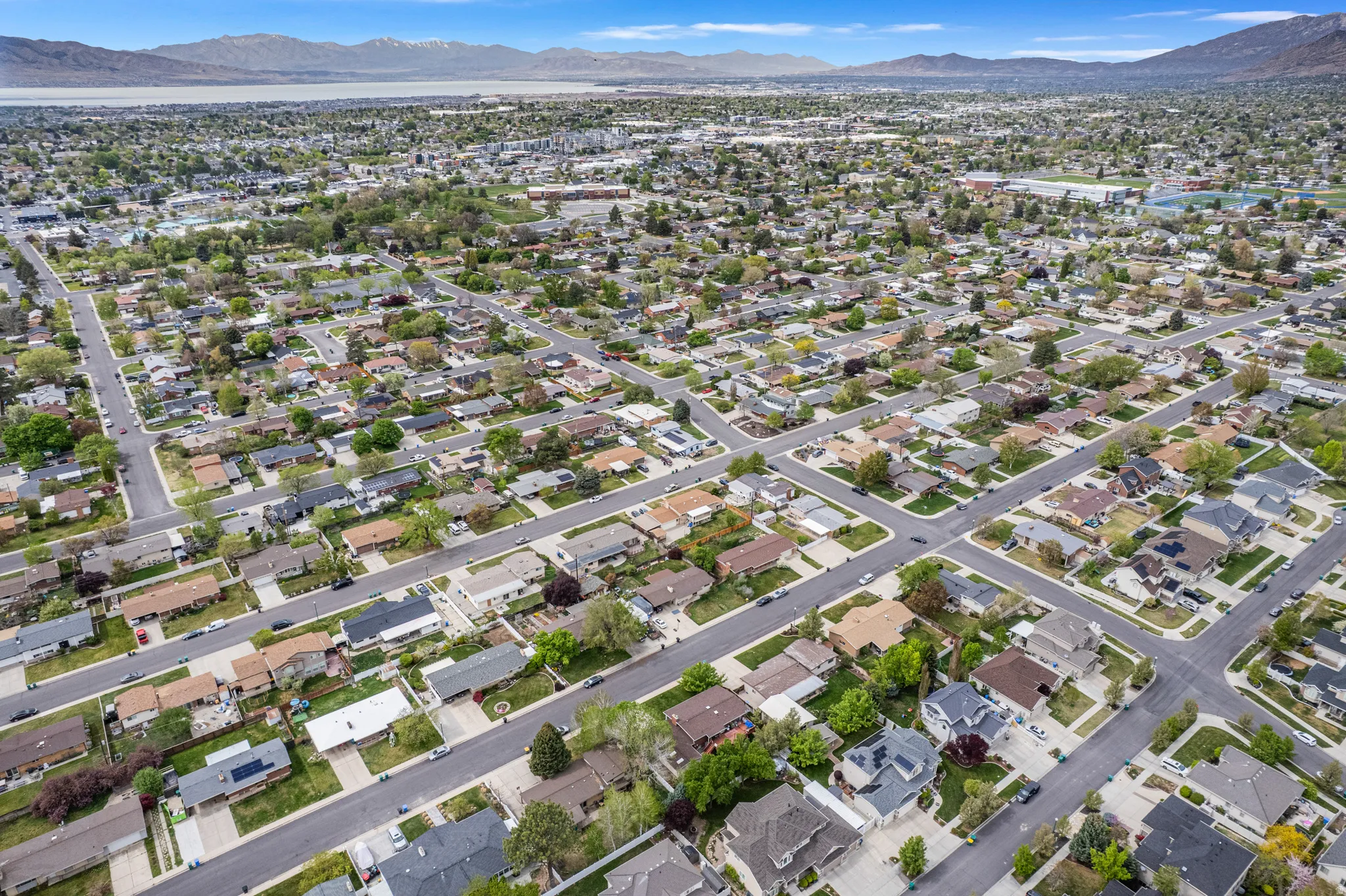 Aerial perspective of suburban area with mountains
