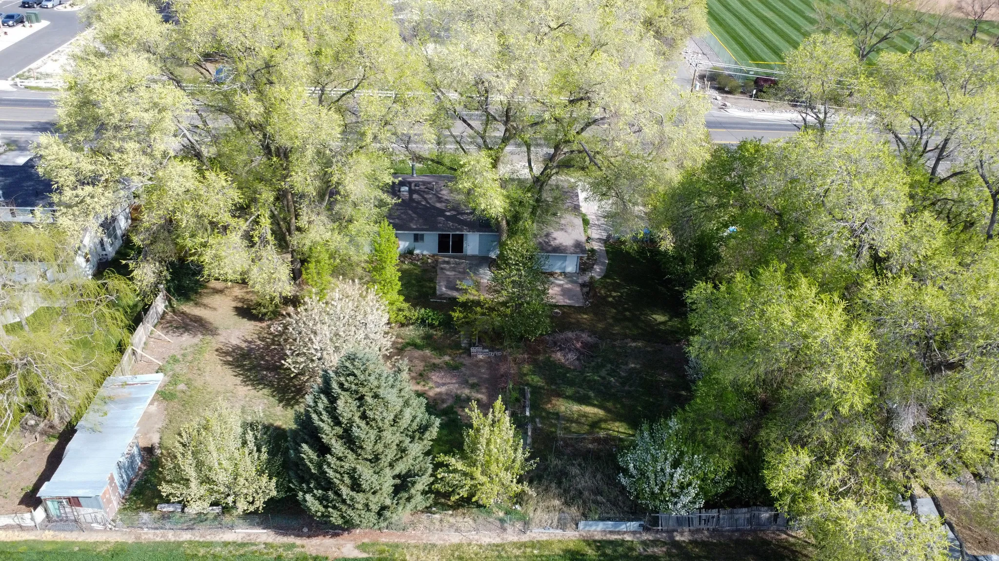 Aerial view of sparsely populated area featuring extensive farmland