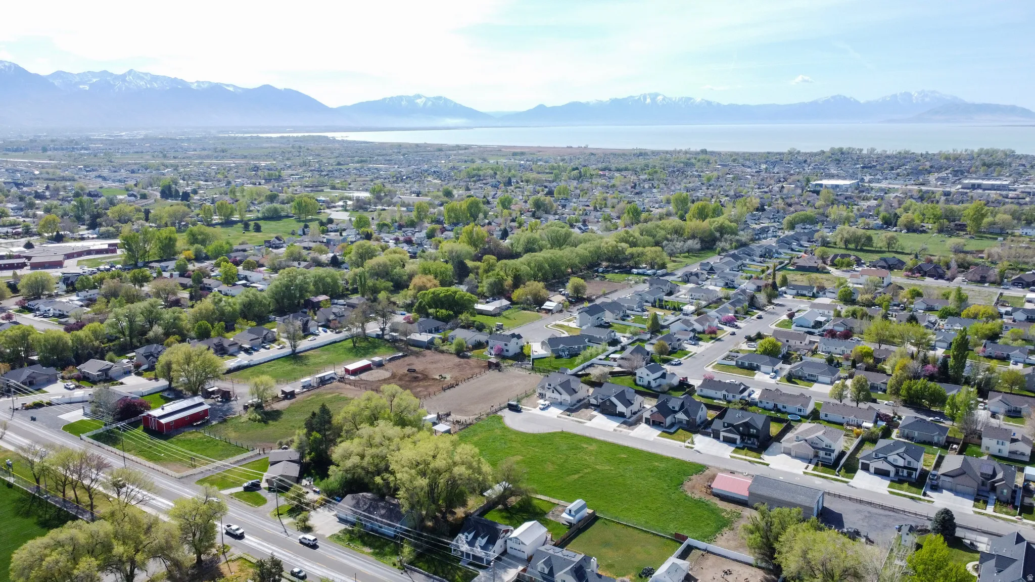 Aerial view of residential area featuring mountains