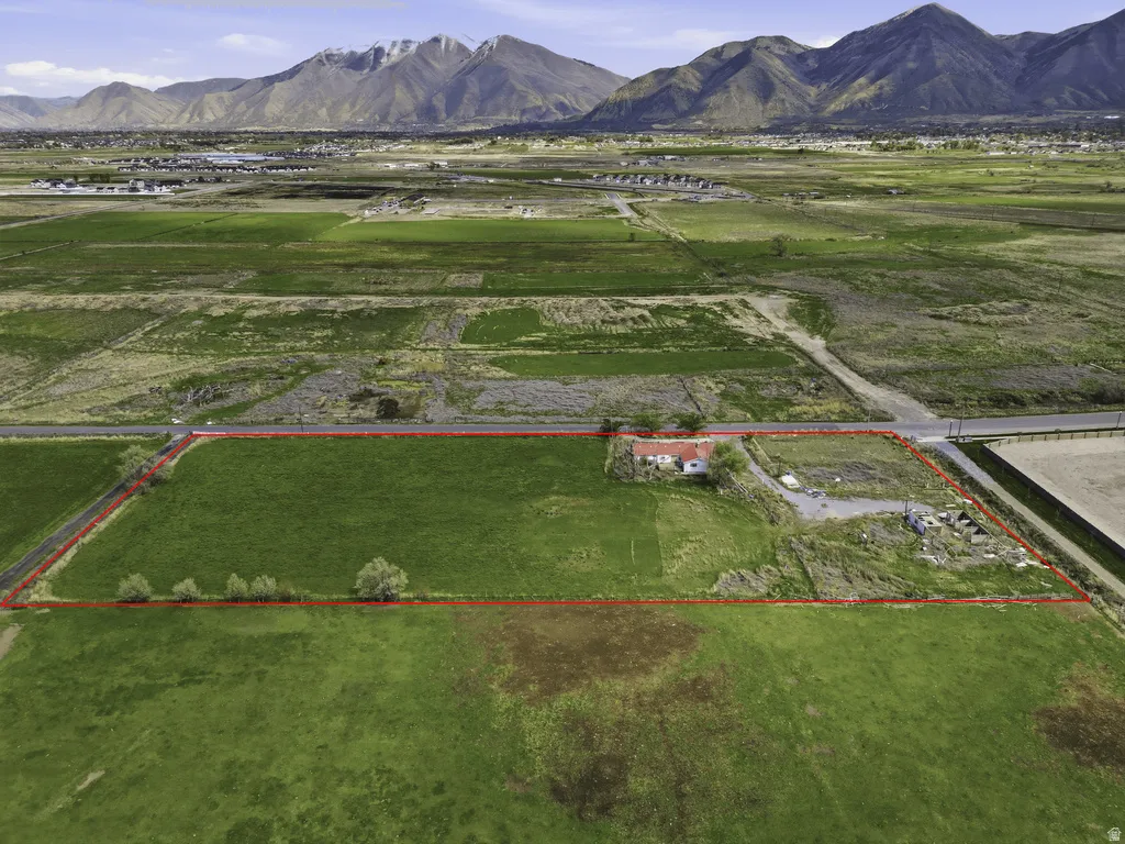 View of rural area featuring property parcel outlined and mountains
