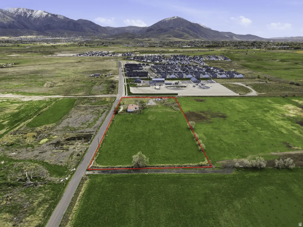 View of rural area featuring property parcel outlined and a mountainous background