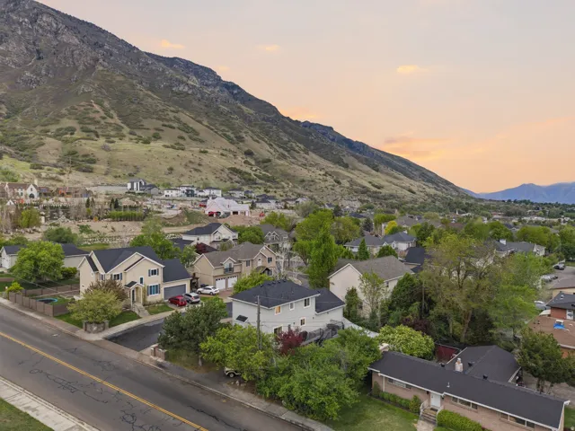 Aerial view of residential area with a mountain backdrop