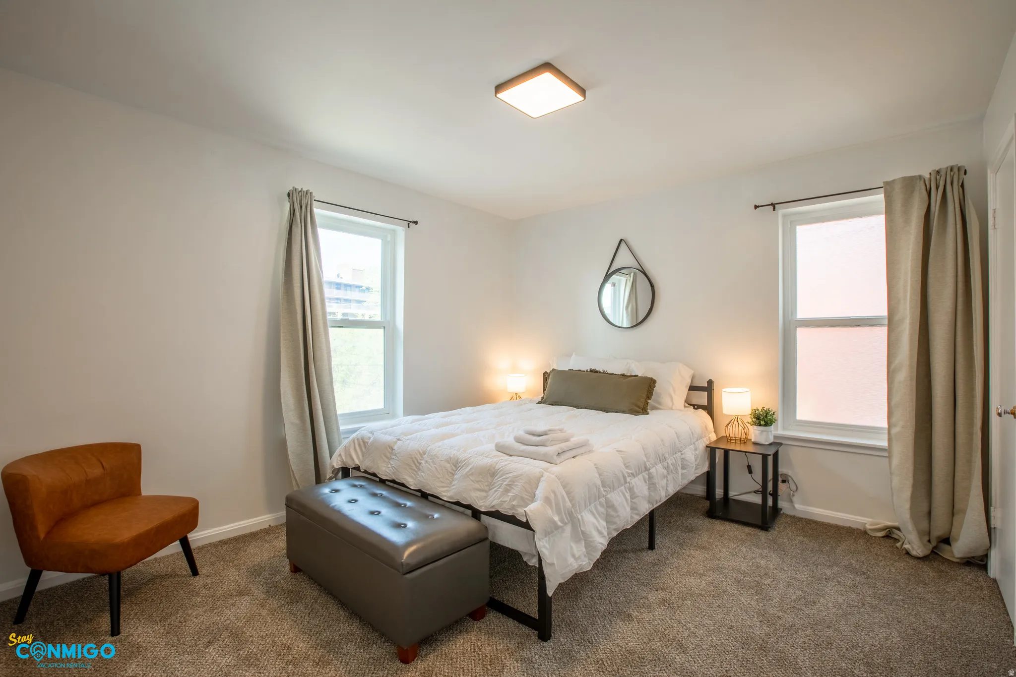 Bedroom with baseboards and carpet