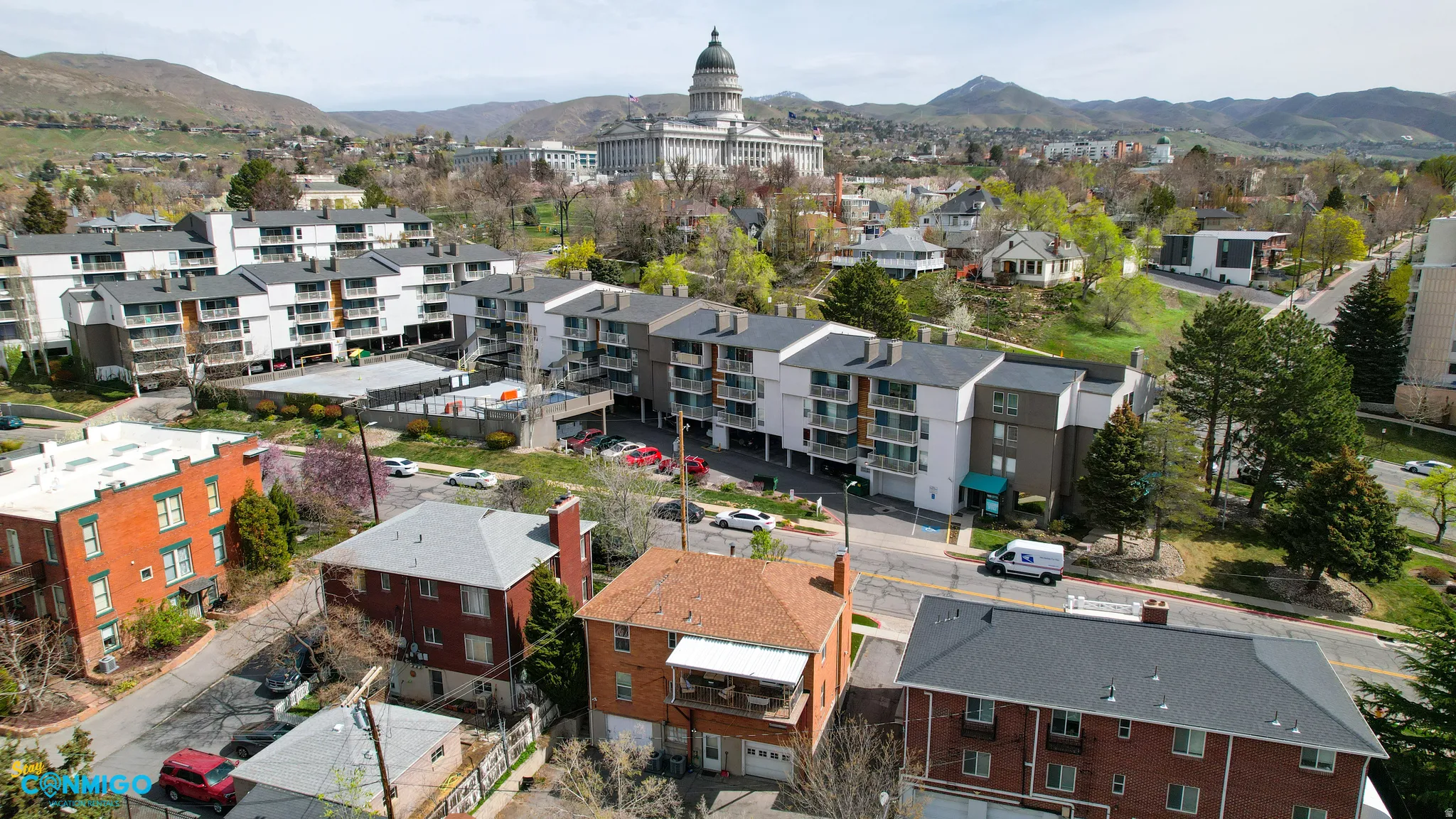 Bird's eye view of mountains and apartment complex