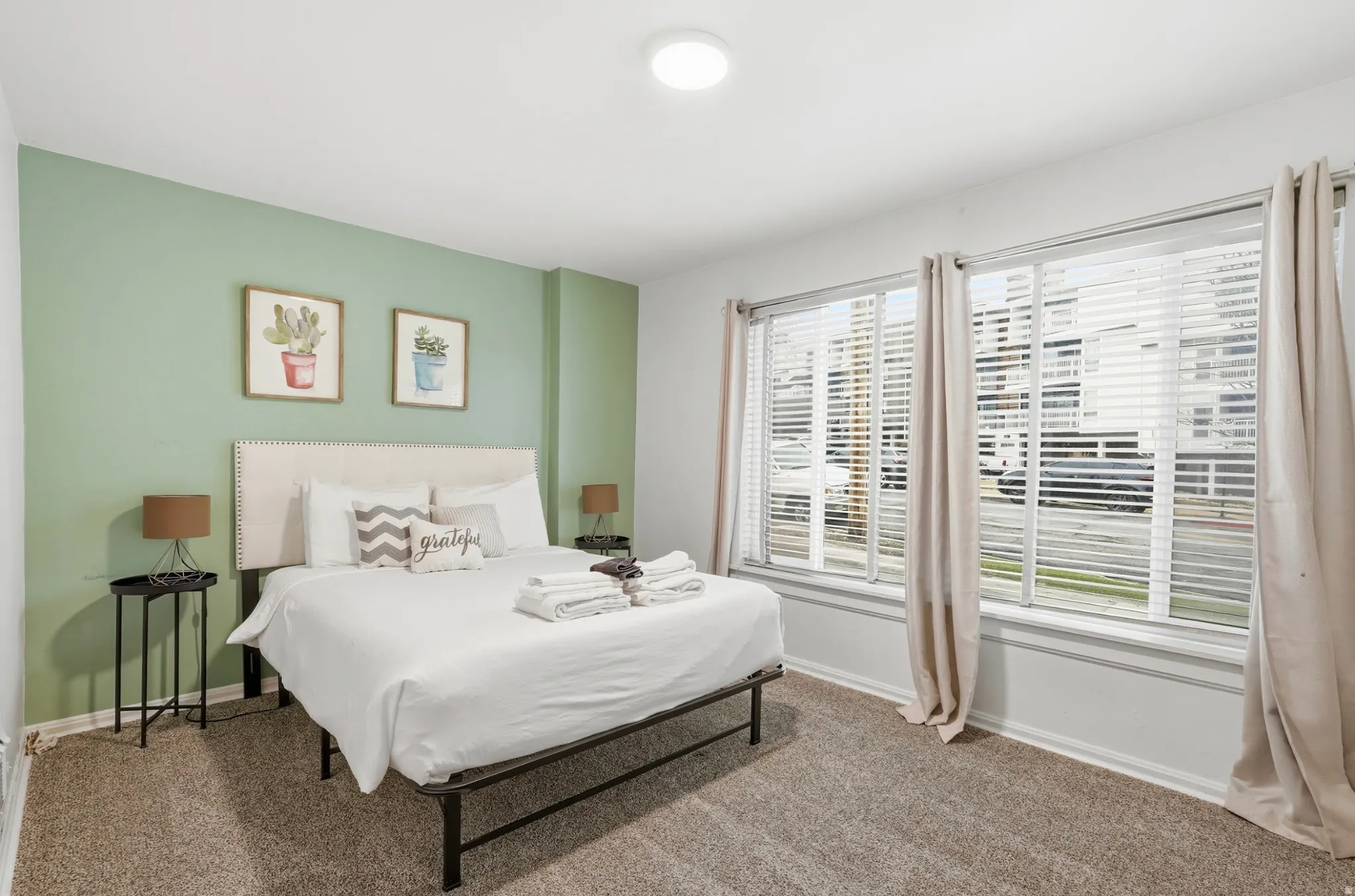 Carpeted bedroom with baseboards