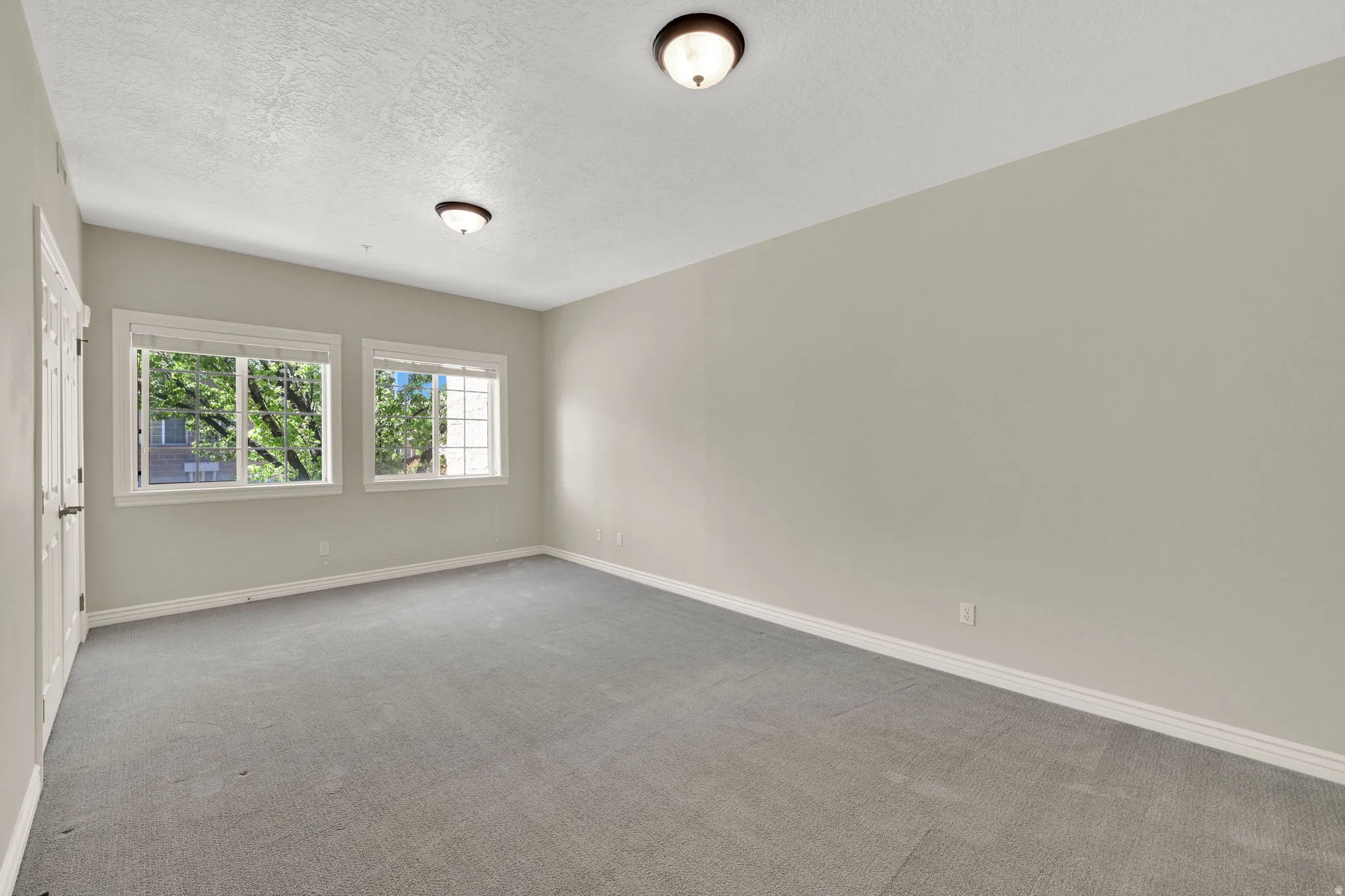 Primary bedroom as seen from entry door