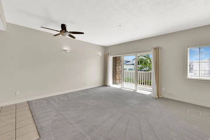 Living room and large slider to patio as seen from entry