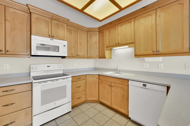 Clean, bright, kitchen with abundant storage