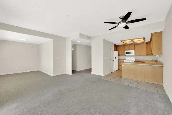 Dining room, flyer, and kitchen as seen from living room slider.
