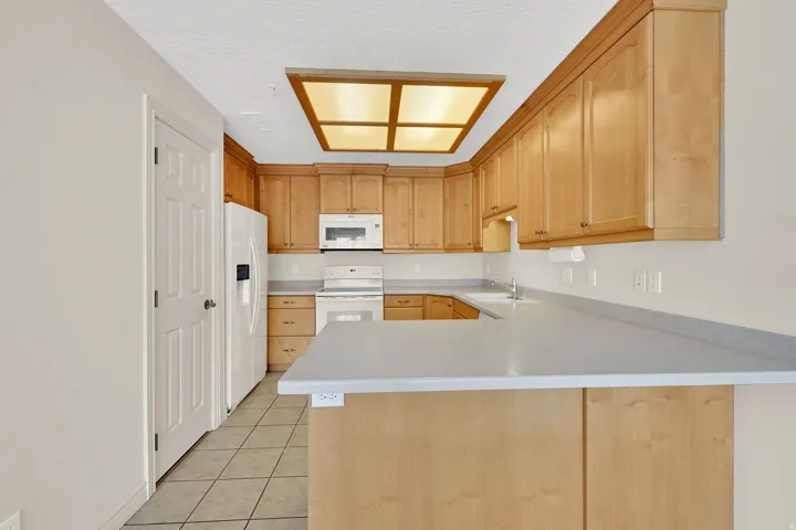 Ample countertop space for multiple cooks, and a breakfast bar for the grandkids.