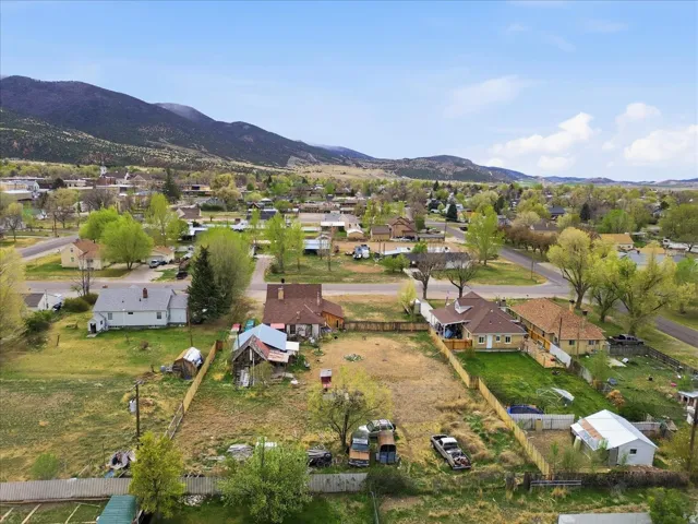 Aerial perspective of suburban area featuring mountains