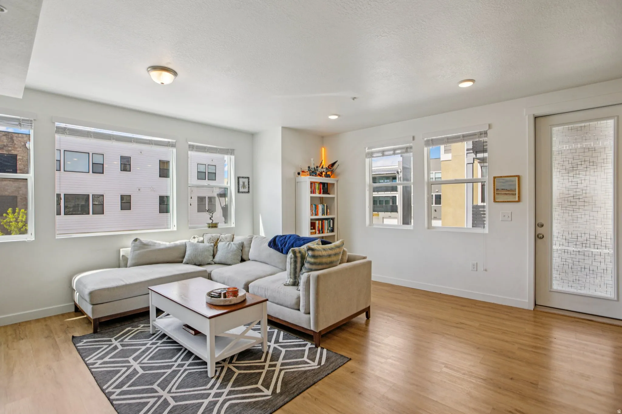 Living area featuring light wood-style flooring