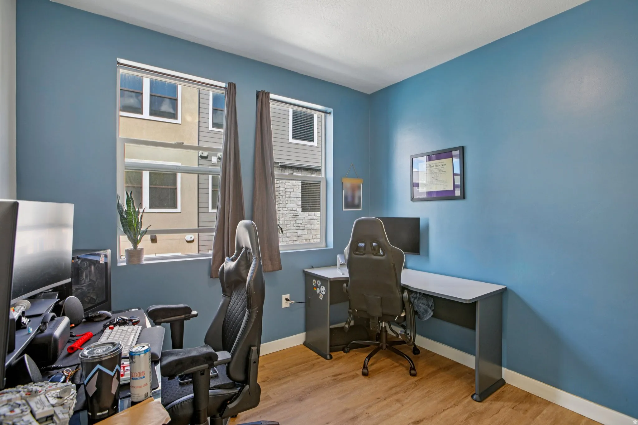 Office featuring light wood-style flooring and baseboards