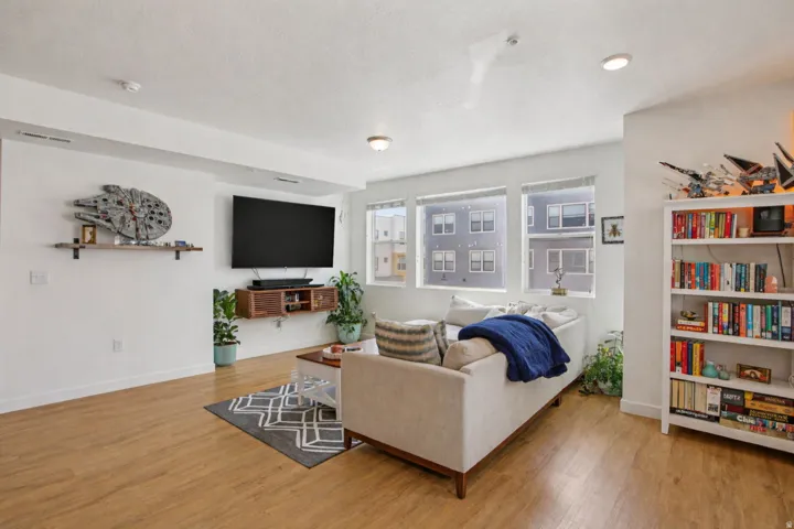 Living area with light wood finished floors
