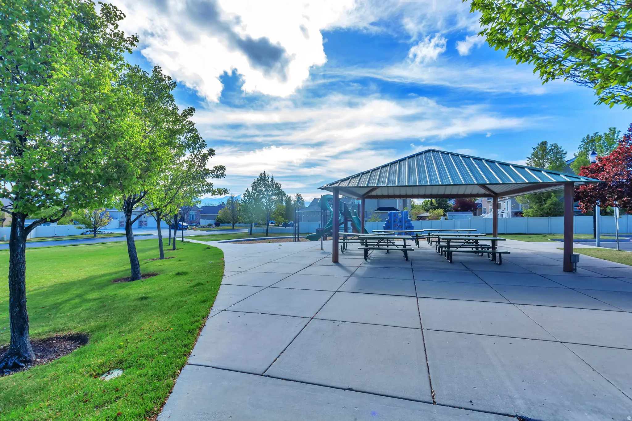 Surrounding community featuring a patio area and a gazebo