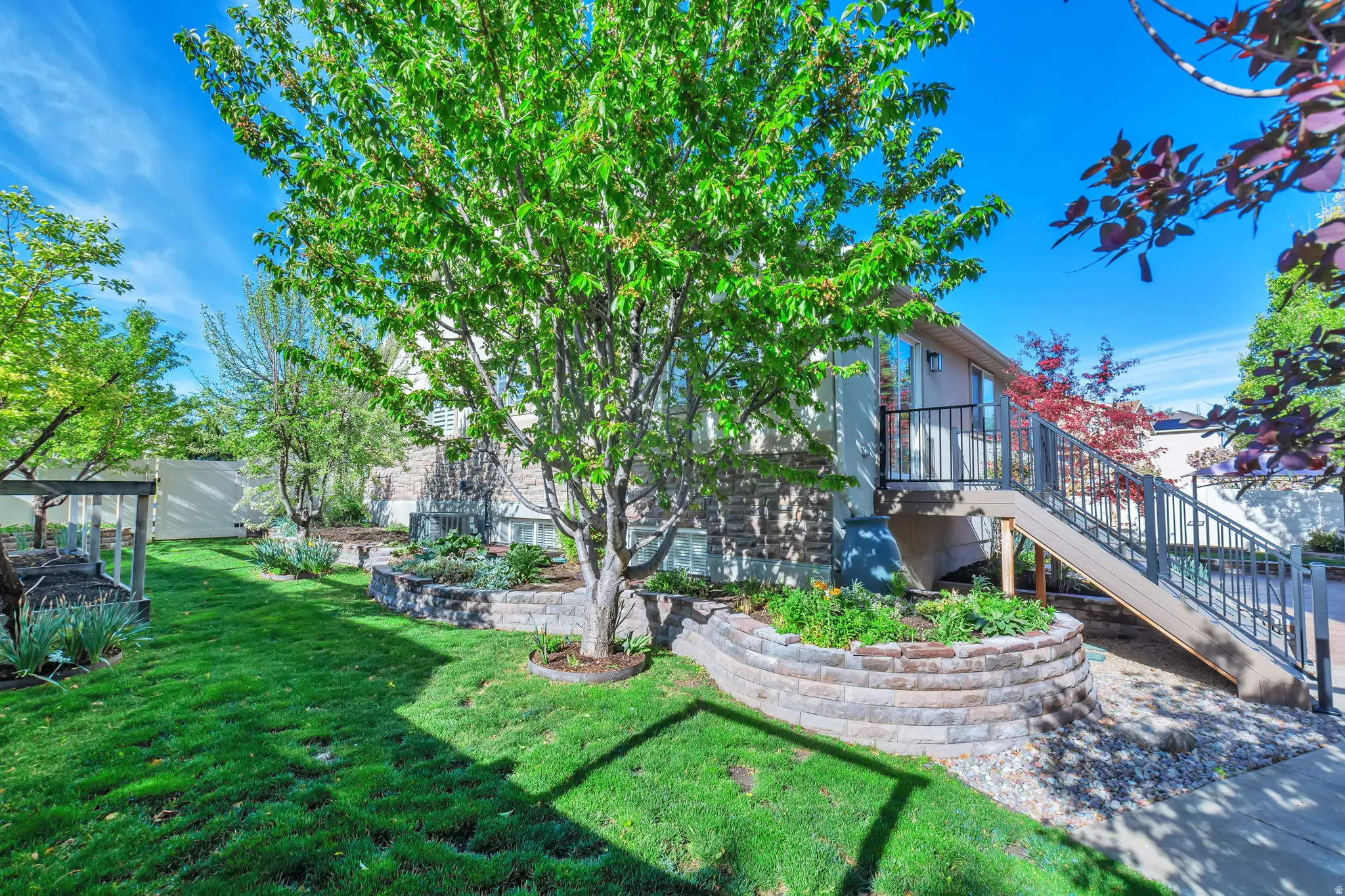 View of yard featuring stairs