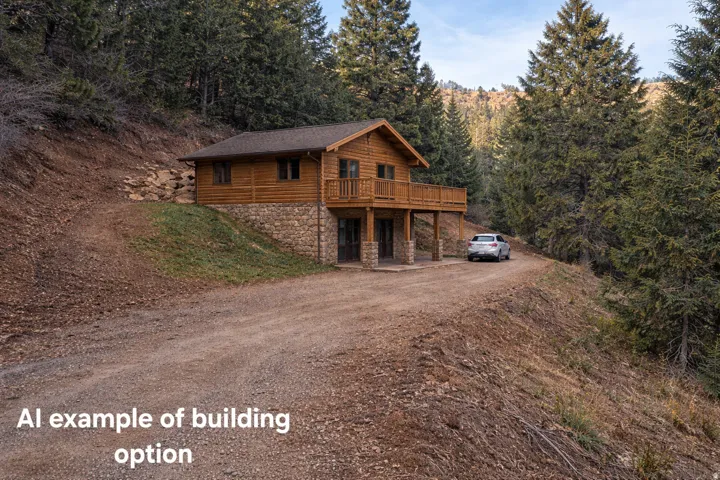 View of front facade featuring stone siding, dirt driveway, a wooded view, and a deck