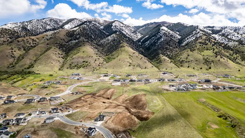 Mountain view featuring nearby suburban area