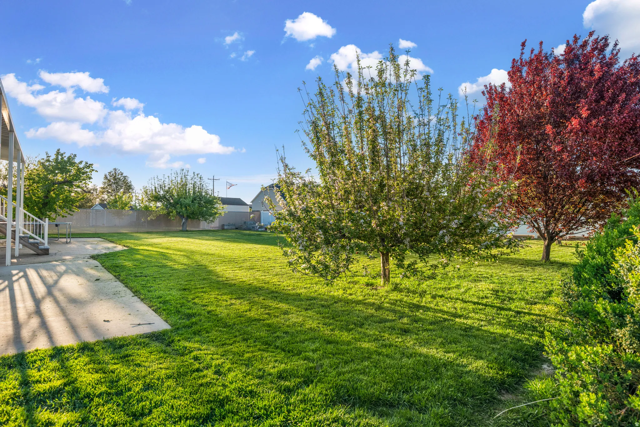 Fenced yard with a patio