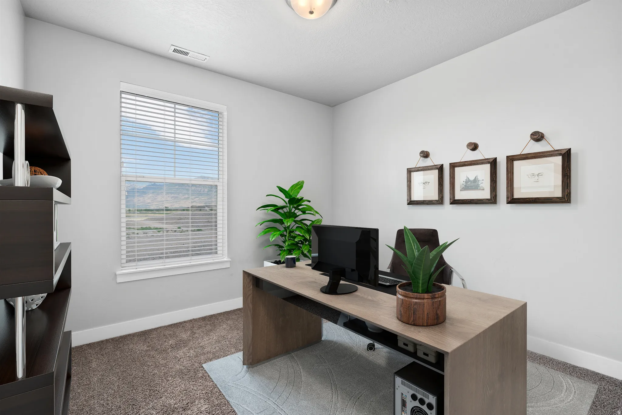 Office area with carpet flooring