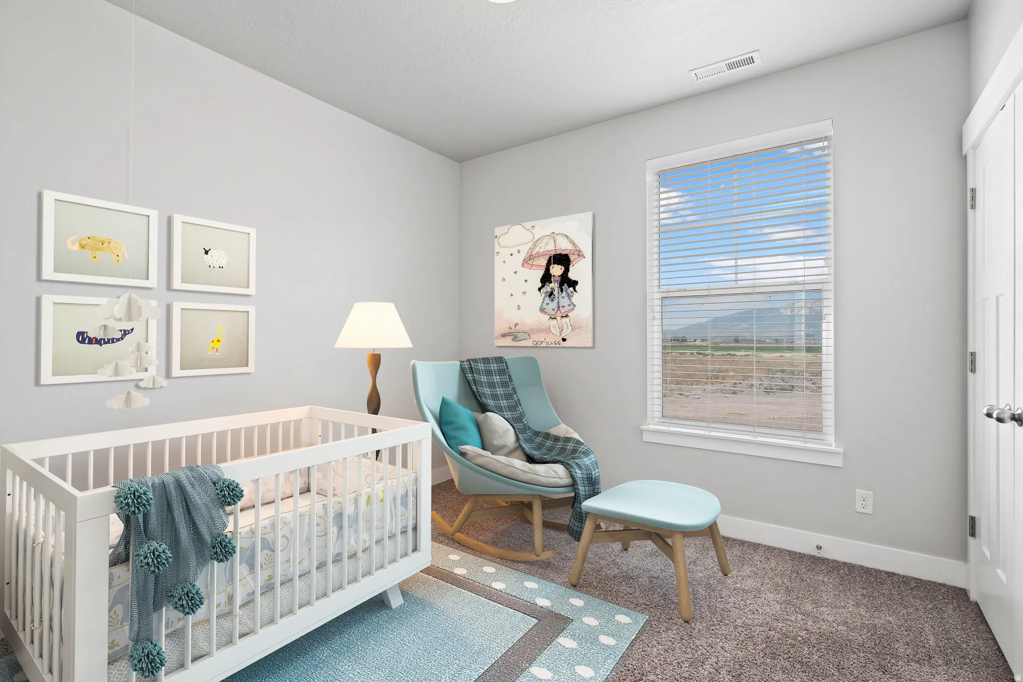 Carpeted bedroom featuring a crib and baseboards