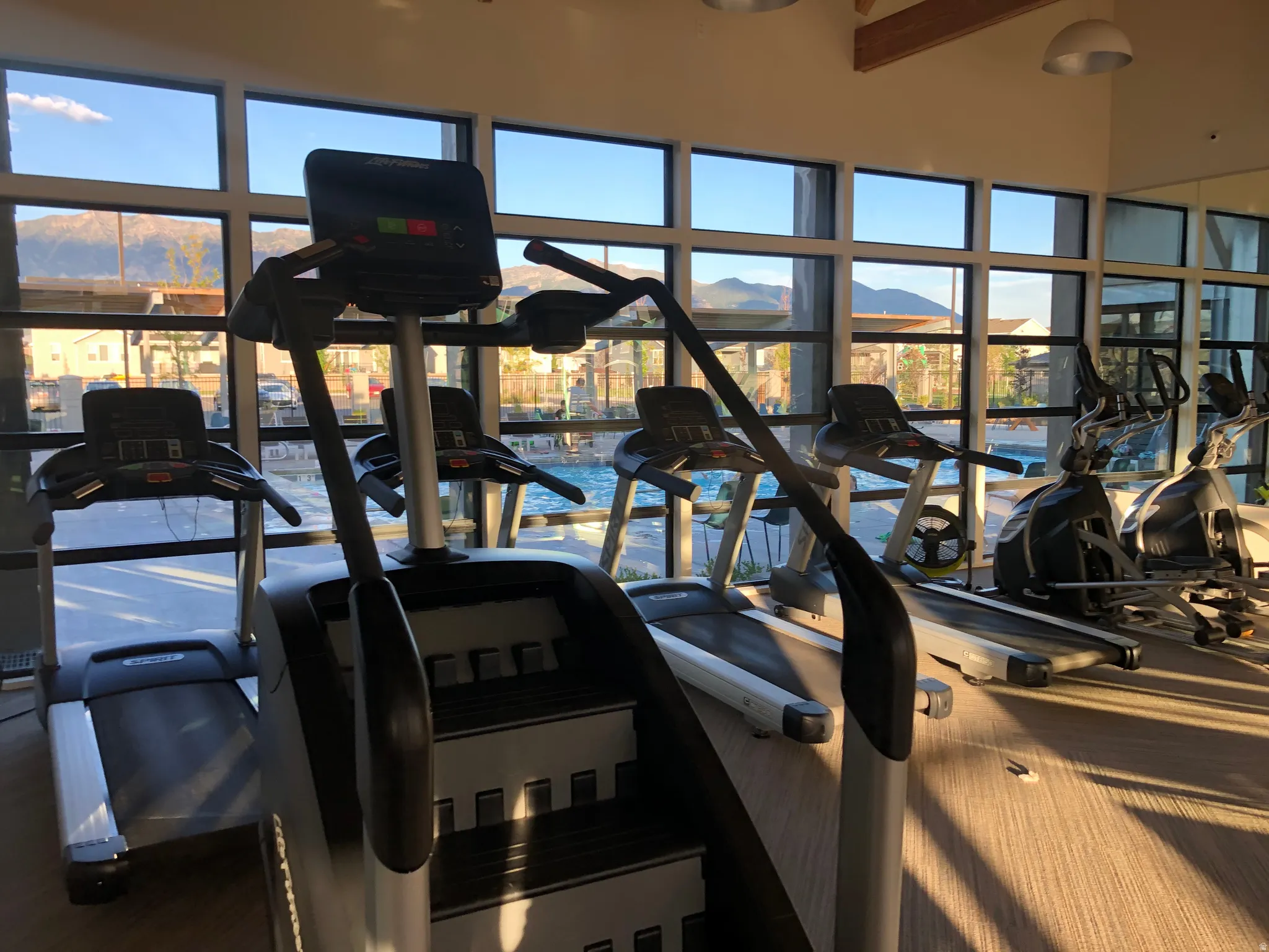 Workout area featuring a high ceiling
