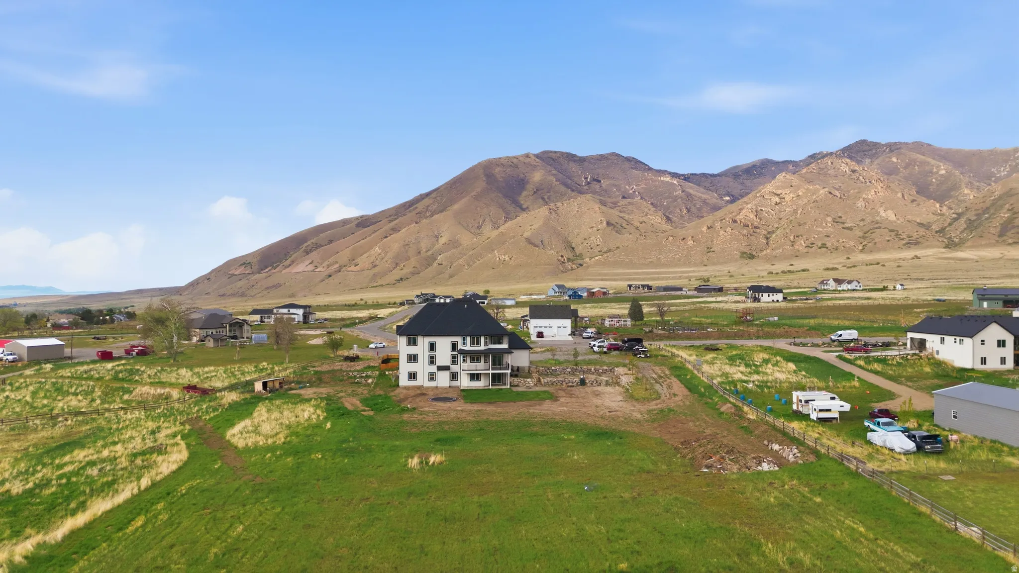 View of mountain background featuring rural landscape