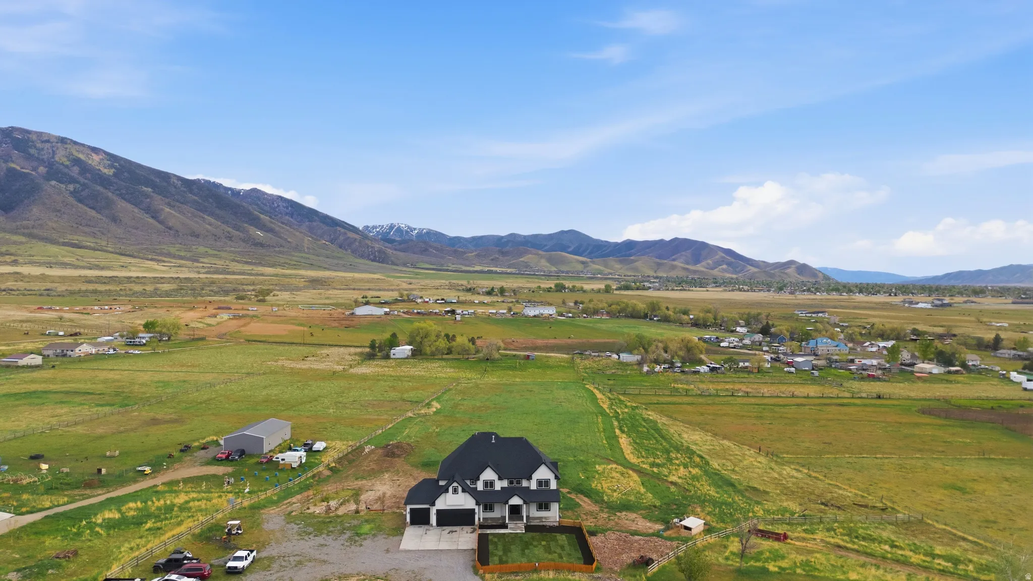View of rural area featuring a pastoral area and a mountain backdrop