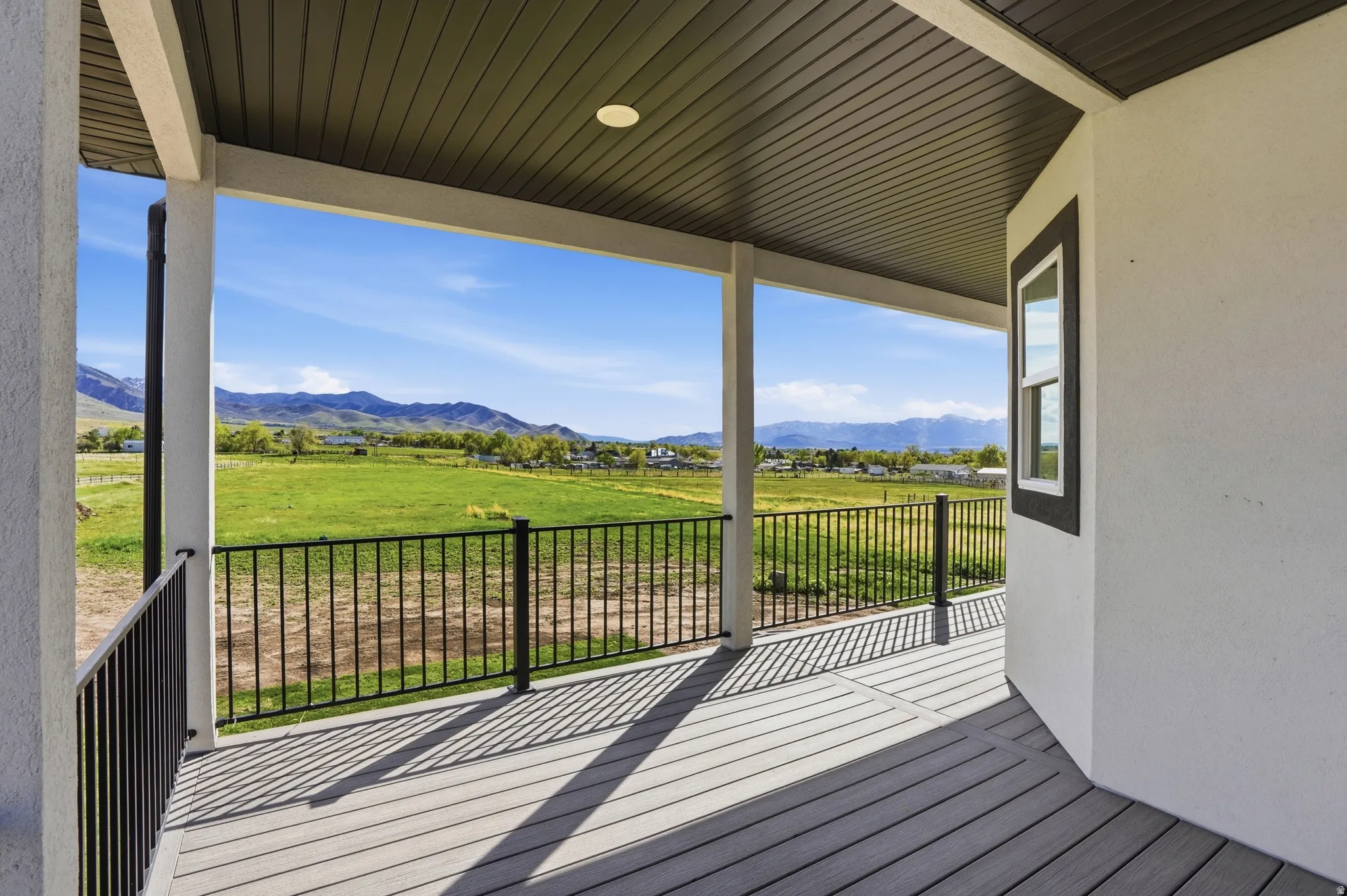 South Facing View! Wooden deck with a mountain view and a view of countryside