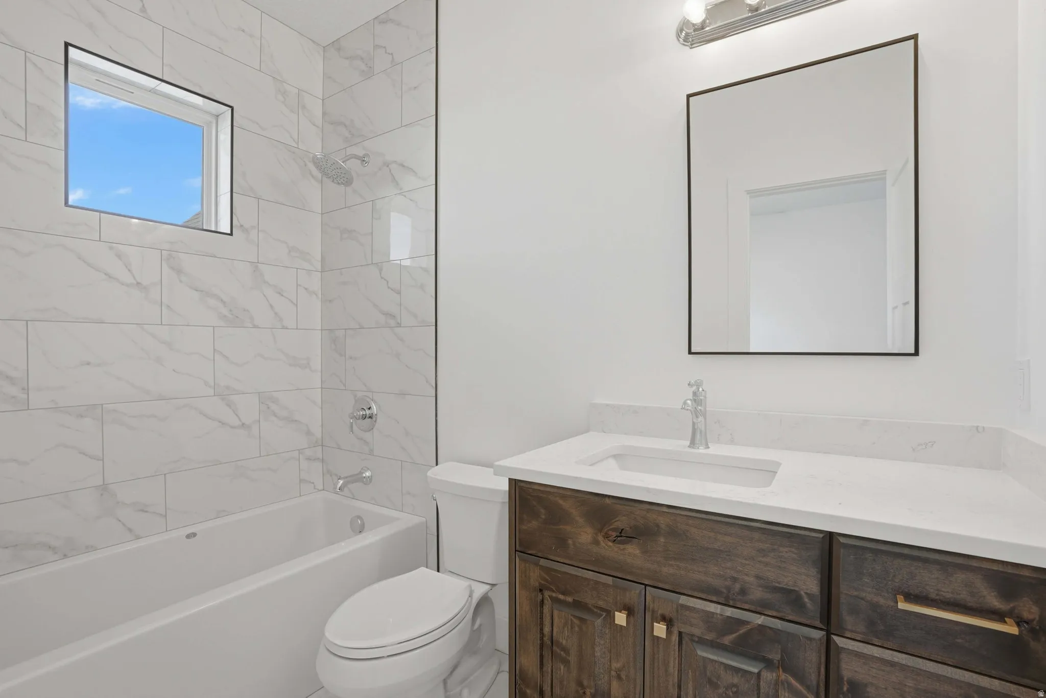 Private Bathroom with vanity and shower / bathtub combination