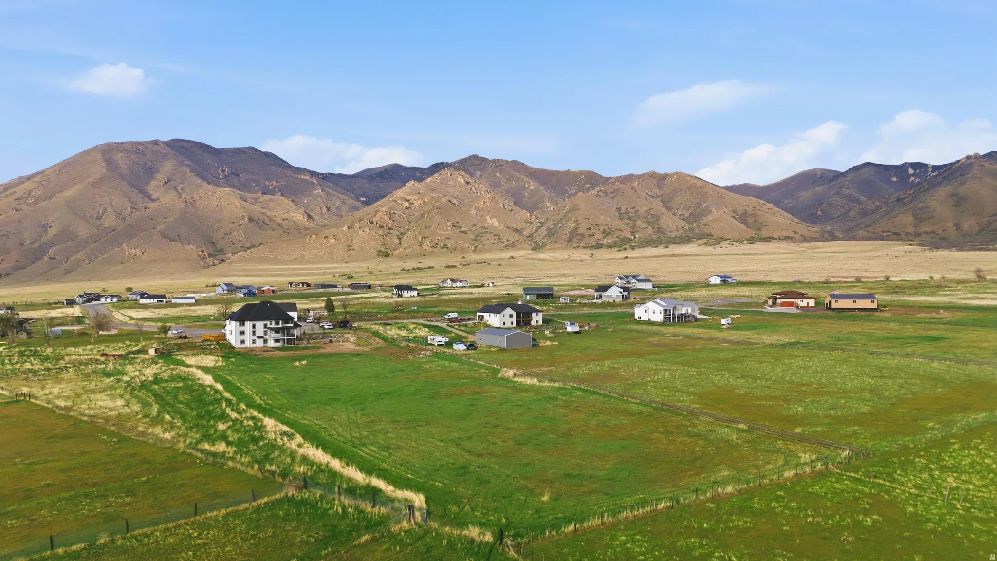 View of mountain backdrop featuring rural landscape and a pastoral area