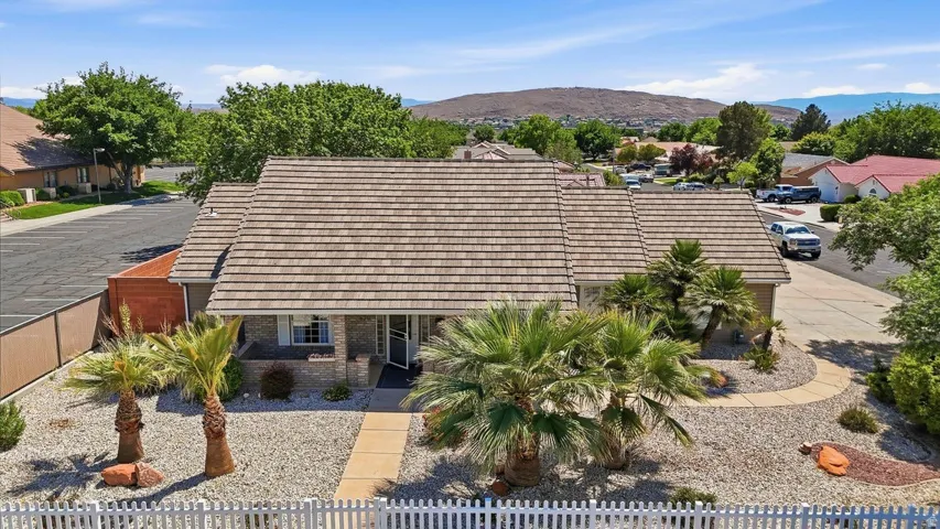 Aerial view of residential area featuring a mountain backdrop
