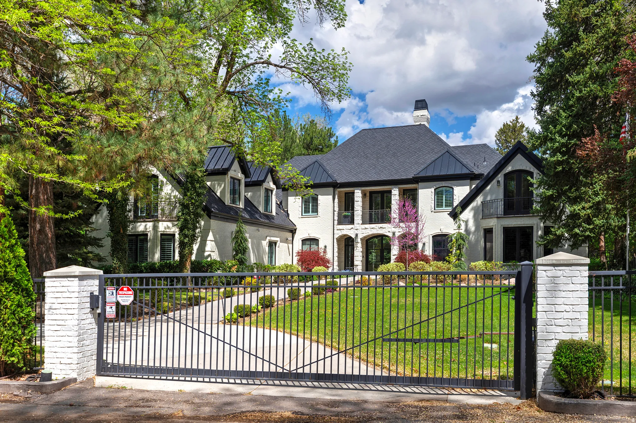Privacy and seclusion with iron fencing and two security gates.