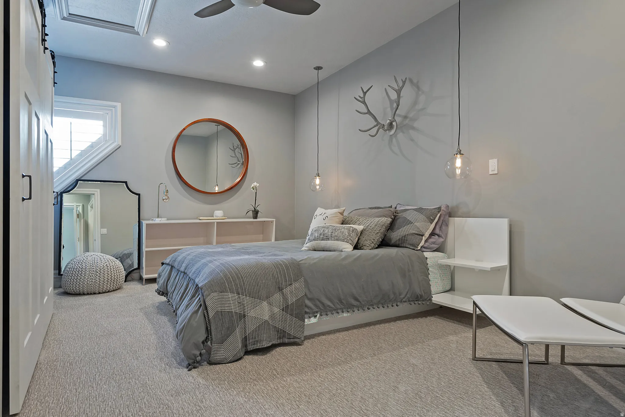 Elevated en-suite guest suite with laundry room, full bathroom and large closet.